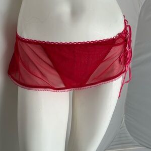 Fashion Bug red mesh skirted thong panty with pink ribbon side embellishment